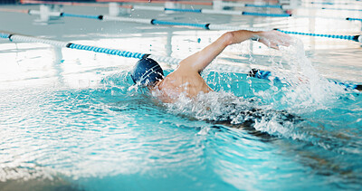 Buy stock photo Swimming, man and fitness for athlete, active and practice for competition, healthy and routine in pool. Cardio, training and performance of person in water, exercise or swimmer with energy for sport