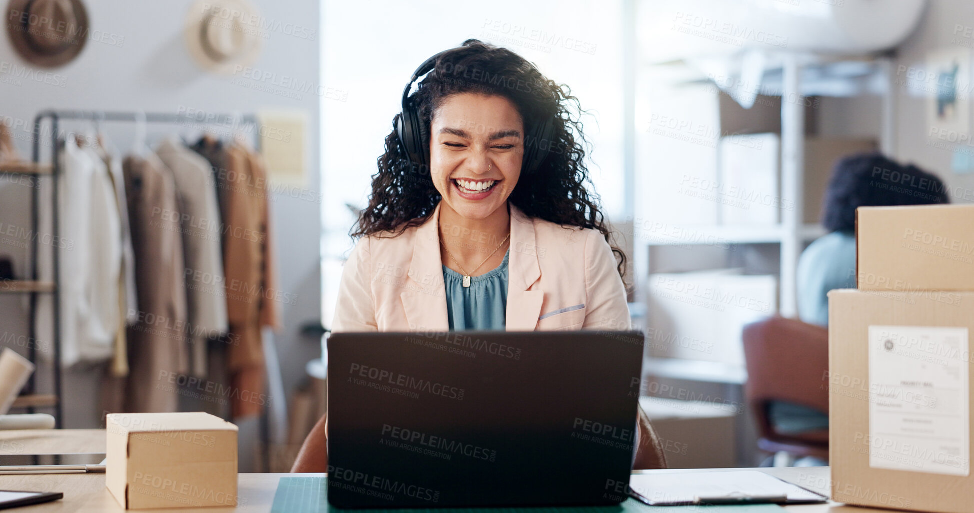 Buy stock photo Laptop, video call and woman with cardboard box in office for ecommerce, courier or confirmation. Computer, headphones and female designer with live streaming for sale promotion with cargo packages.