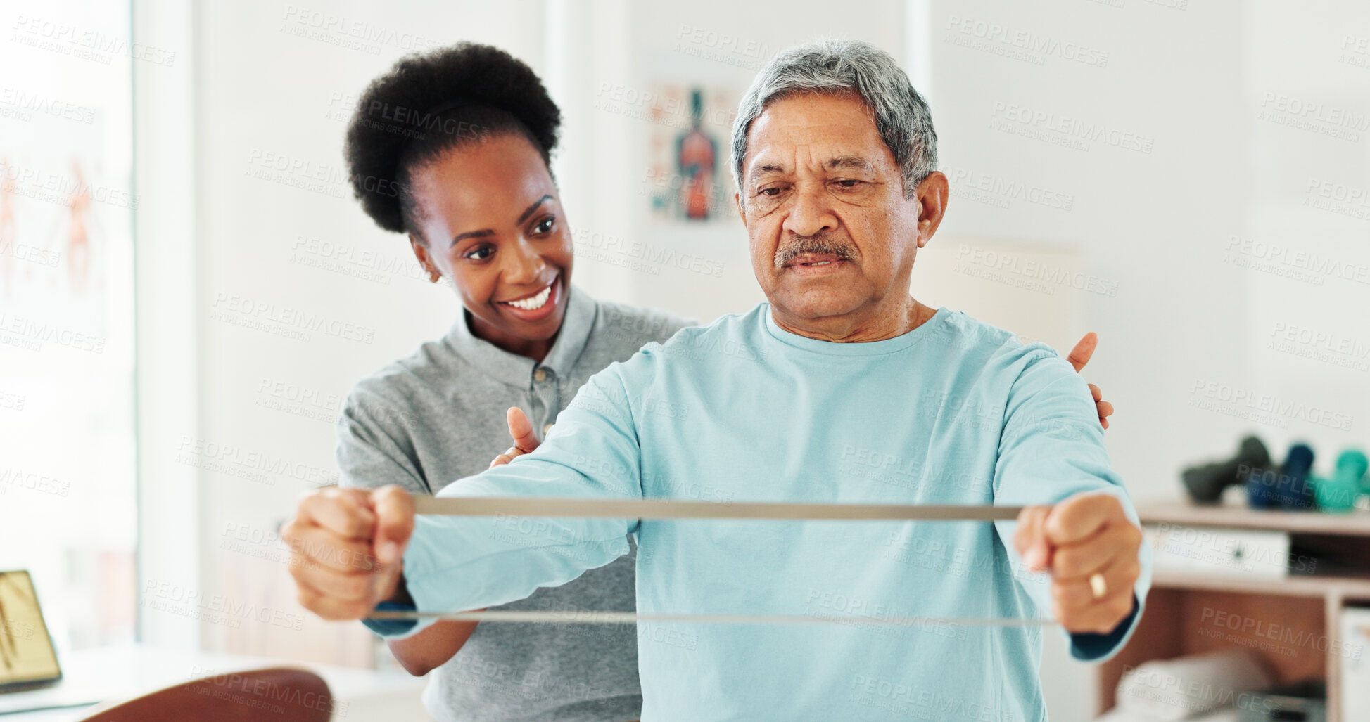 Buy stock photo Resistance band, physical therapy and mature man in clinic for consultation with muscle recovery. Injury, healthcare and woman physiotherapist helping senior male patient with stretch arm exercise