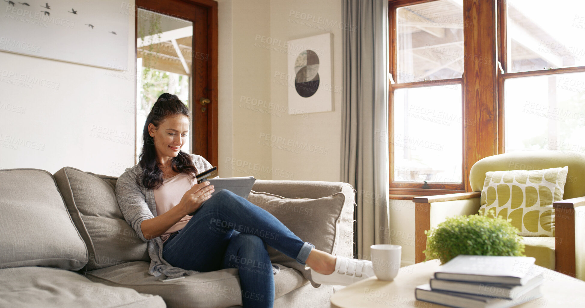 Buy stock photo Home, typing and woman with tablet, credit card and connection with payment. Transaction, tech and person on couch, online shopping and ecommerce with banking, purchase and investment in living room