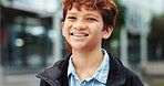 Outdoor, school and boy with braces in portrait, education and studying opportunity with happiness. Campus, male child and student with with confidence for elementary, learning academy and smile