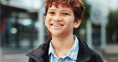 Buy stock photo Outdoor, school and boy with braces in portrait, education and studying opportunity with happiness. Campus, male child and student with with confidence for elementary, learning academy and smile