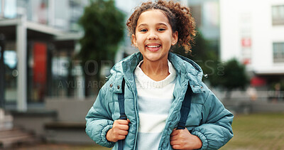 Buy stock photo Happy, city and portrait of child at school outdoors ready for class, lesson and learning with backpack. Smile, youth and young girl on campus excited for education, knowledge and development 