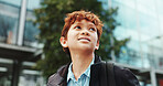Outdoor, child and student with backpack for school, education and studying opportunity with thinking. Campus, happy boy and walking with thoughts for elementary, learning academy and learner outside