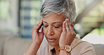 Stress, headache and senior woman in home with worrying, overthinking or mental health. Anxiety, mistake and elderly female person with migraine in living room for regret, vertigo or brain fog.