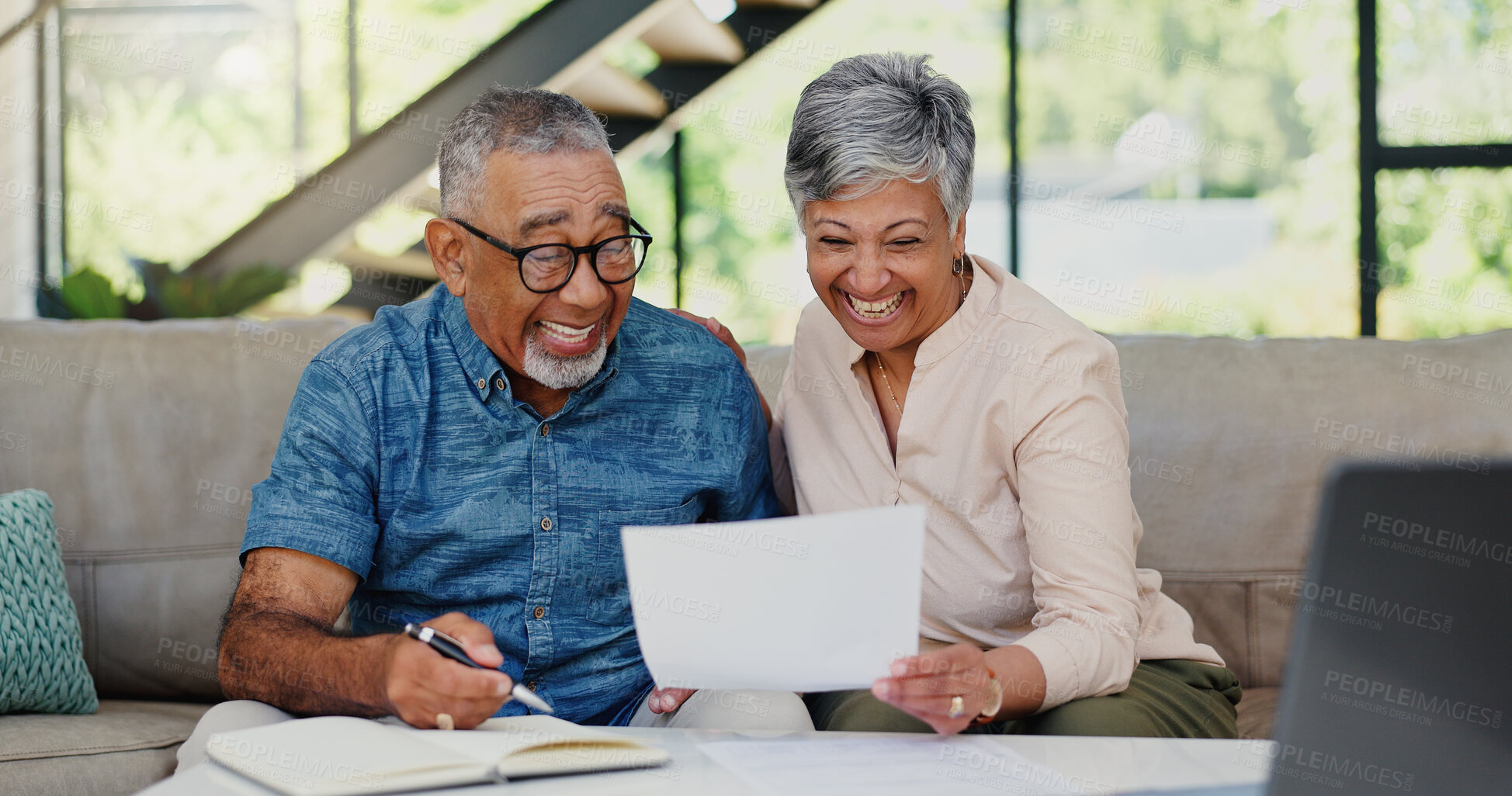 Buy stock photo Excited, documents and senior couple on sofa in discussion for debt, mortgage or bills payment completed. Happy, investment and elderly man with woman for retirement funds plan with paperwork in home