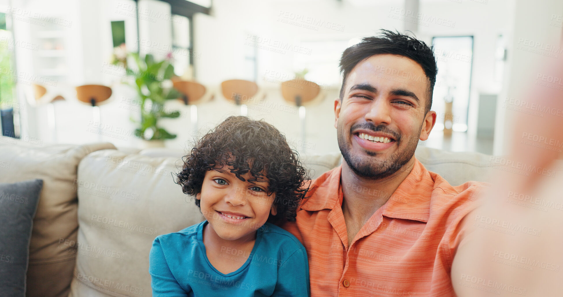 Buy stock photo Selfie, dad and bonding with child, home and picture with son in lounge, portrait and smile for memory. Happy, man and care for kid in living room, photography and father with boy in house or relax