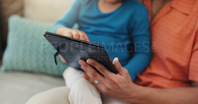 Buy stock photo Hands, parent and child with tablet, watching and streaming cartoons on website, bonding or online. Browsing, person and kid with tech for movie, connection or entertainment with subscription in home