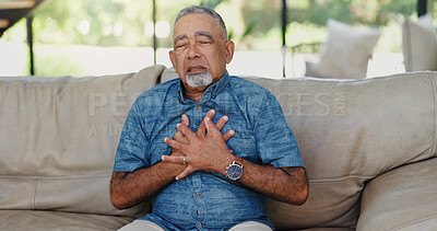 Buy stock photo Senior man, stress and chest pain with heart attack on sofa for health fail, artery pressure and medical emergency. Cardiovascular, elderly person or discomfort with cardiac arrest and danger in home