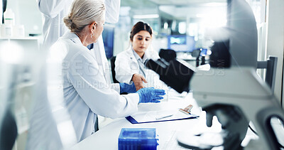 Buy stock photo People, scientist and tube for test in lab of medical, research, dna discovery and vaccine solution. Team, researcher and chemistry with gene particles for investigation, healthcare medicine and cure