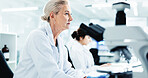 Mature woman, scientist and reading in lab for research, information and results of medical study. Person, researcher and review experiment of biotechnology, assessment report and healthcare solution
