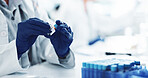 Scientist, hands and gloves with blood sample or label for DNA test, exam or medical discovery at laboratory. Closeup, person or research with vitals for clinic results, analysis or cure at lab