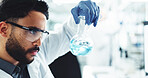 Chemical, man and scientist with beaker in laboratory for medical vaccine development or study. Liquid, glass and male chemist working on pharmaceutical research, study or project with observation.