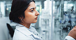 Glass wall, science and writing with woman in laboratory for equation, formula or solution. Healthcare, innovation and medical with person at work on clinical trial for pharmaceutical breakthrough