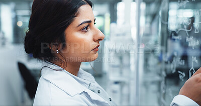 Buy stock photo Glass wall, science and writing with woman in laboratory for equation, formula or solution. Healthcare, innovation and medical with person at work on clinical trial for pharmaceutical research