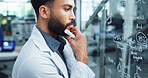 Man, scientist and thinking with equation on glass board for clinic results or science development at lab. Male person, research or wonder with brainstorming for chemical formulation or new molecules