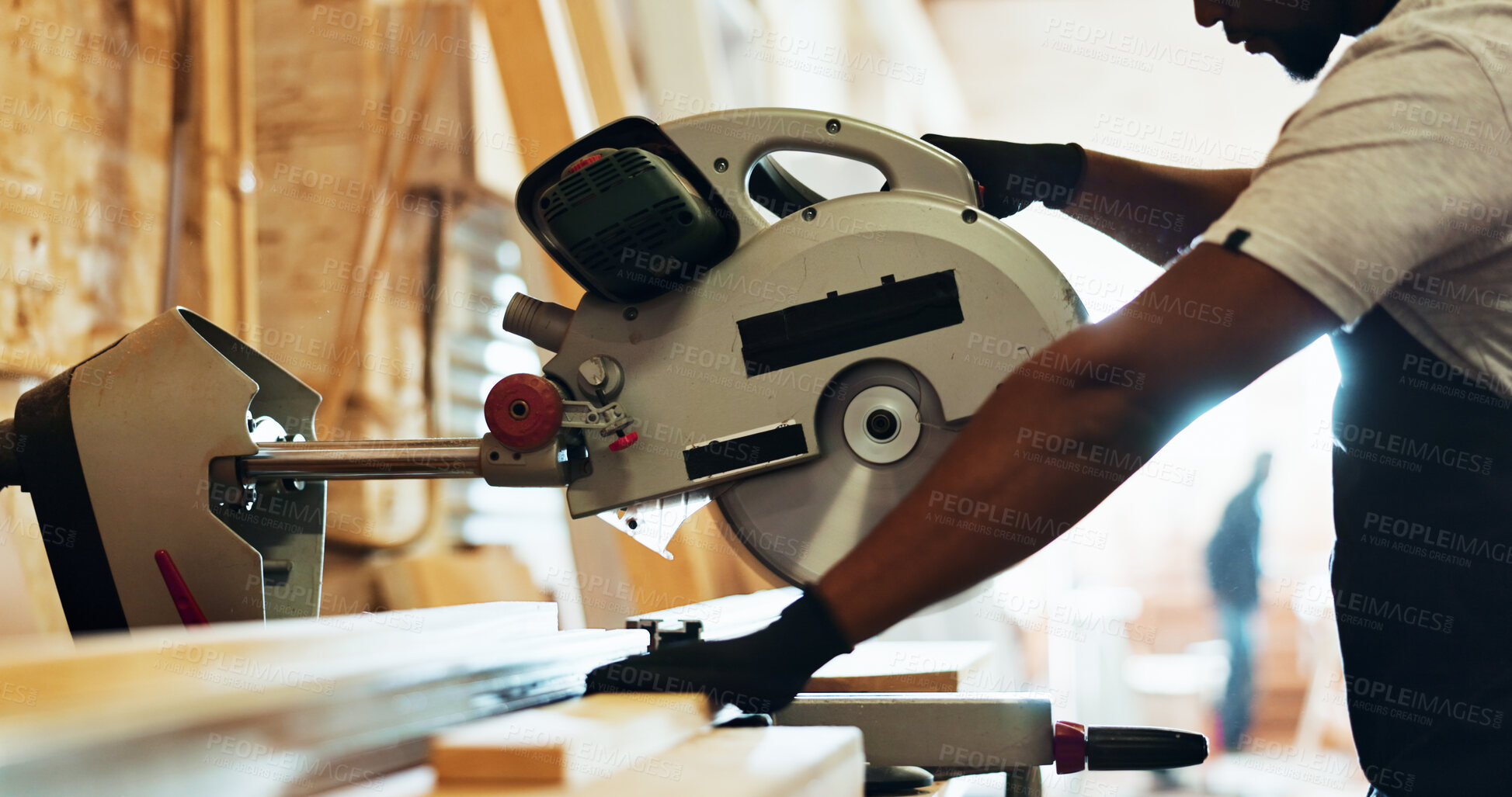 Buy stock photo Workshop, hands and machine with plank for carpenter, diy manufacturing and production business. Warehouse, man and contractor with saw tools for professional service, maintenance and cutting wood
