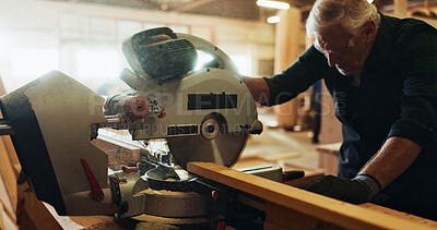 Buy stock photo Workshop, man and machine with wood for carpenter, plank manufacturing and production business. Warehouse, mature person and contractor with saw tools for professional service, maintenance or project