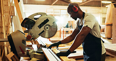 Buy stock photo Carpenter, black man and machine with wood in workshop, diy manufacturing and production business. Factory, male person and contractor with saw tools for furniture service, maintenance and cut plank