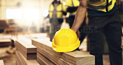 Buy stock photo Worker, hand and hardhat on site for construction safety, health compliance, industrial development and labor. Architecture, person and helmet security for building renovation, protection and gear