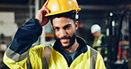 Engineer, happy and portrait with helmet at factory for manufacturing, industry and pride for career at workshop. Person, artisan or technician with ppe, smile and excited for job at production plant