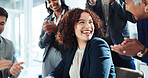Happy woman, teamwork and applause with promotion for congratulations, well done or good job at office. Female person, celebration and smile with colleagues clapping for success together at workplace