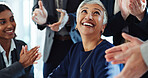 Happy woman, team and applause with promotion for congratulations, well done or good job at office. Female person, celebration and smile with group or colleagues clapping for success at workplace