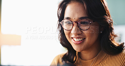 Buy stock photo Creative, glasses and smile of designer woman in office for planning, report or research. Computer, eyewear and reading with happy design employee in workplace for development or online project