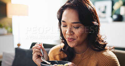 Buy stock photo Smile, woman and eating food on sofa for healthy cuisine, nutrition or flavor enjoyment with relax. Dinner, person and hungry with pasta bowl in living room for lunch meal and weekend break in house