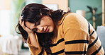 Home, headache and woman on sofa, pain and stress with fatigue in living room. Apartment, tired and person with burnout, migraine and exhausted with health risk, overworked and frustrated in lounge