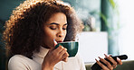 Woman, drinking and watching tv with coffee on sofa for entertainment, show or series at home. Female person, relax or online streaming for movie with caffeine, drink or beverage on couch at house