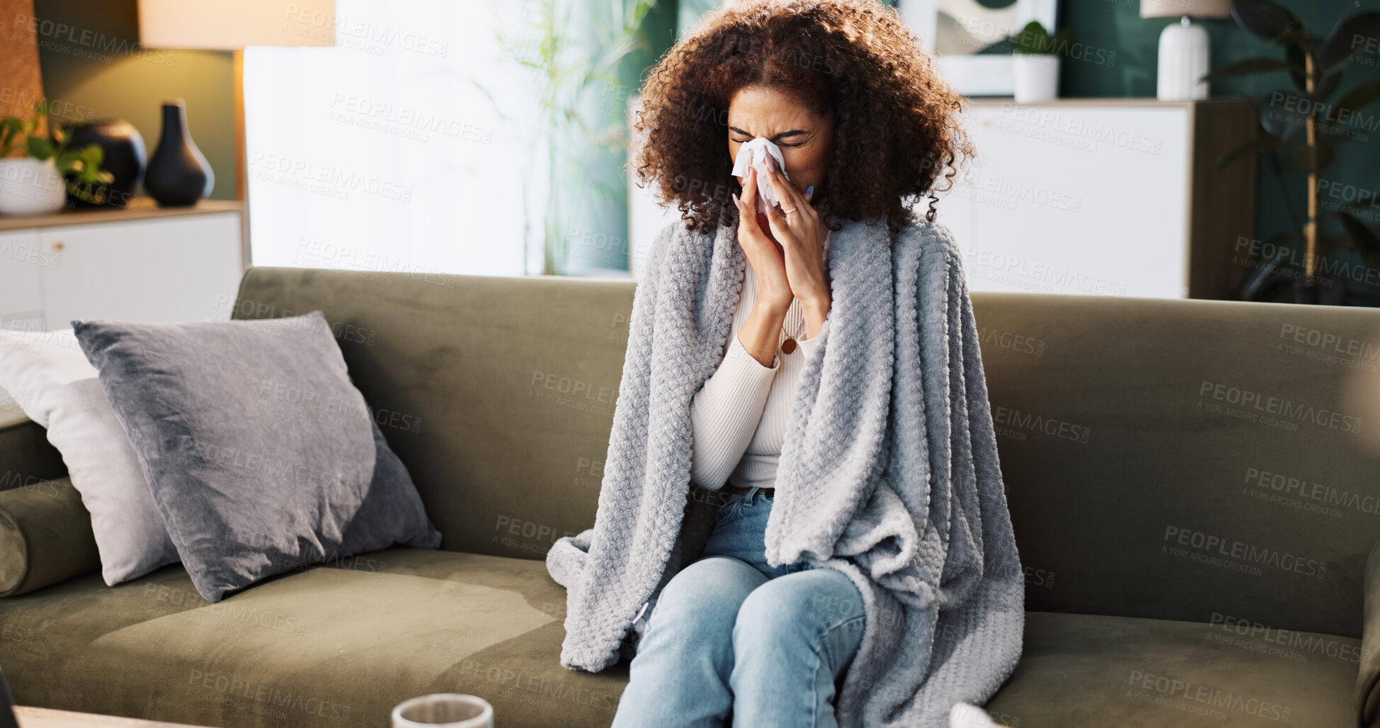 Buy stock photo Blowing nose, sick and tissue with woman on sofa for medical recovery, illness and flu season. Disease, fatigue and fever with female person in living room at home for virus outbreak and cold