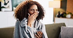 Sneeze, sick and tired with woman on sofa for medical recovery, illness and flu season. Disease, fatigue and fever with female person and blanket in living room at home for virus outbreak and cold
