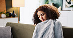 Tired, sick and blanket with woman on sofa for medical recovery, illness and flu season. Disease, fatigue and fever with female person in living room at home for virus outbreak, infection and cold