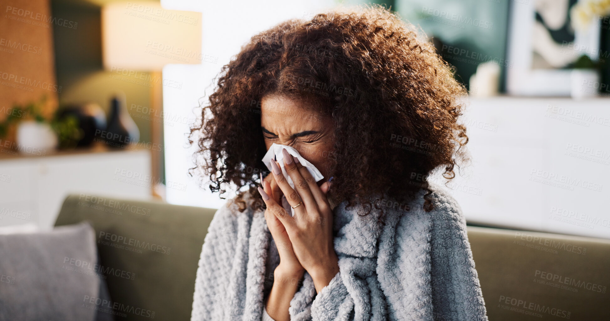 Buy stock photo Sneeze, sick and blowing nose with woman on sofa for medical recovery, illness and flu season. Disease, fatigue and fever with female person in living room at home for virus outbreak and cold