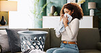 Laundry, woman and smell clothes in home for fresh scent, detergent fragrance and clean linen. Washing basket, housewife and towel aroma on sofa for housekeeping, domestic chores and packing fabric