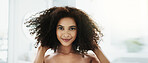 Woman, portrait or afro hair care in bathroom with confidence for grooming, growth or volume. Shampoo, morning routine or African female person with beauty, cosmetics results or curly texture in home
