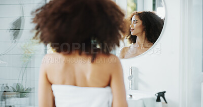 Buy stock photo African woman, mirror and hair care in bathroom with growth for grooming, routine or volume in home. Shampoo, reflection and afro person with confidence, cosmetics results or curly texture for beauty
