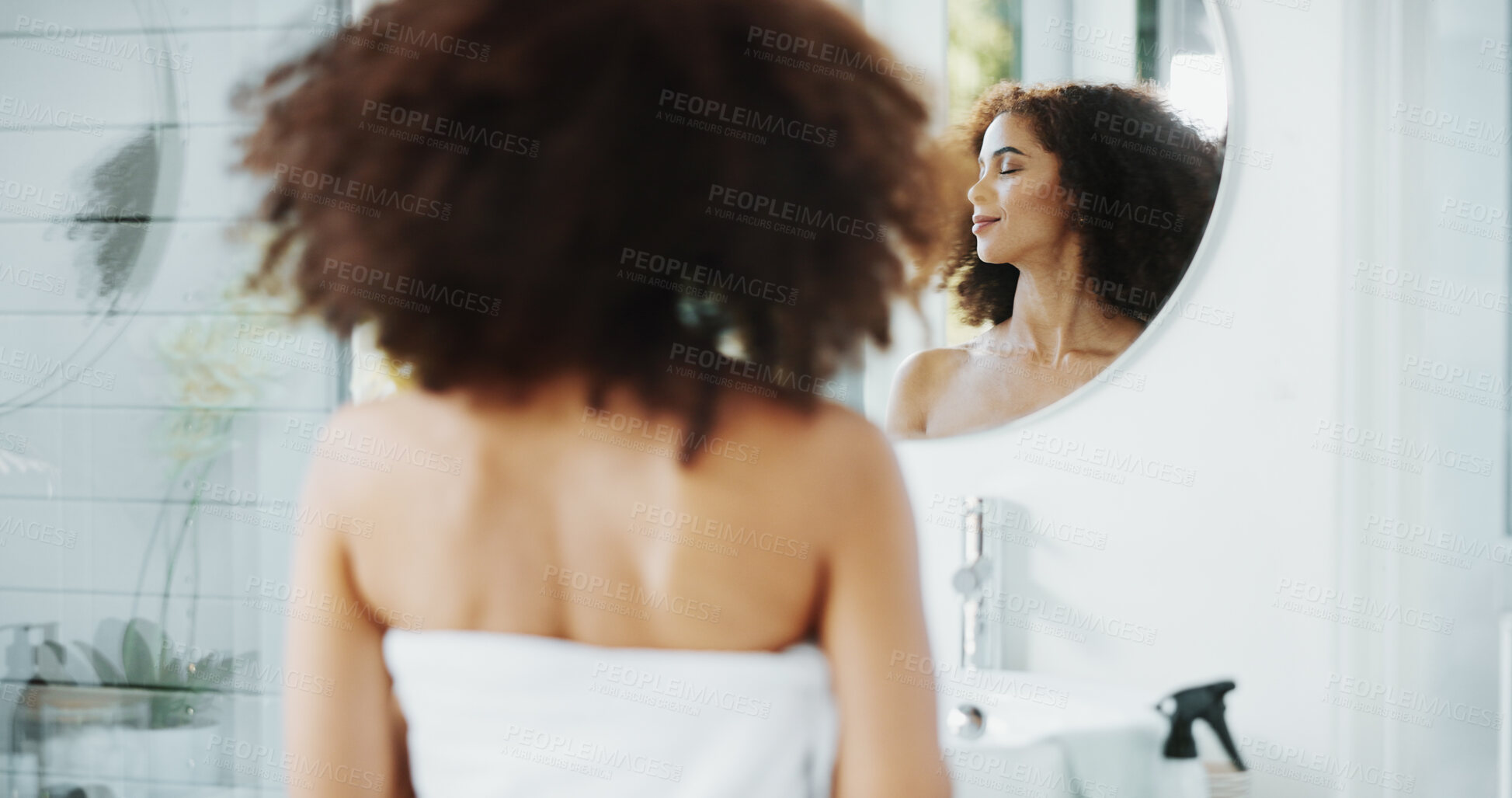 Buy stock photo African woman, mirror and hair care in bathroom with growth for grooming, routine or volume in home. Shampoo, reflection and afro person with confidence, cosmetics results or curly texture for beauty