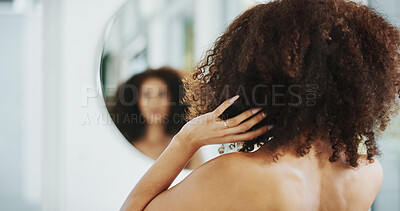 Buy stock photo Hands, afro and hair care by mirror with grooming for check, growth and volume in bathroom at house. African woman, reflection and morning routine for hairstyle, results and curly texture in home