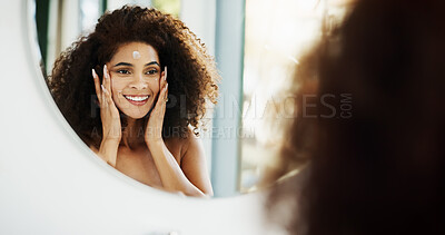 Buy stock photo African woman, cream and mirror with skincare for beauty, wellness or happy for glow in bathroom at house. Person, reflection and morning routine for cosmetics, results and facial cleaning in home