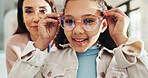 Eyewear, optometry and portrait of girl with woman in hospital for appointment, checkup and eye care. Frame, glasses or vision with child and optometrist in clinic for ophthalmology consulting