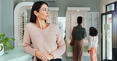 Buy stock photo Woman, sight and thinking with vision at optometry for small business, eyecare or glasses in store. Female person, optometrist or thoughtful shop owner in wonder for eyewear service at optician