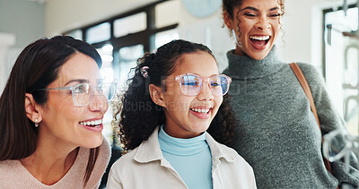 Buy stock photo Happy, family or optometry with girl and woman in hospital for appointment, checkup and eye care. Frame, glasses or vision with excited child and optometrist in clinic for ophthalmology consulting