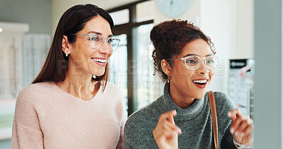 Buy stock photo Optometry, women and client with glasses, happy and friendly service with clear vision. Help, customer or professional in store, trust or advice for designer frame decision, eyewear or consultation