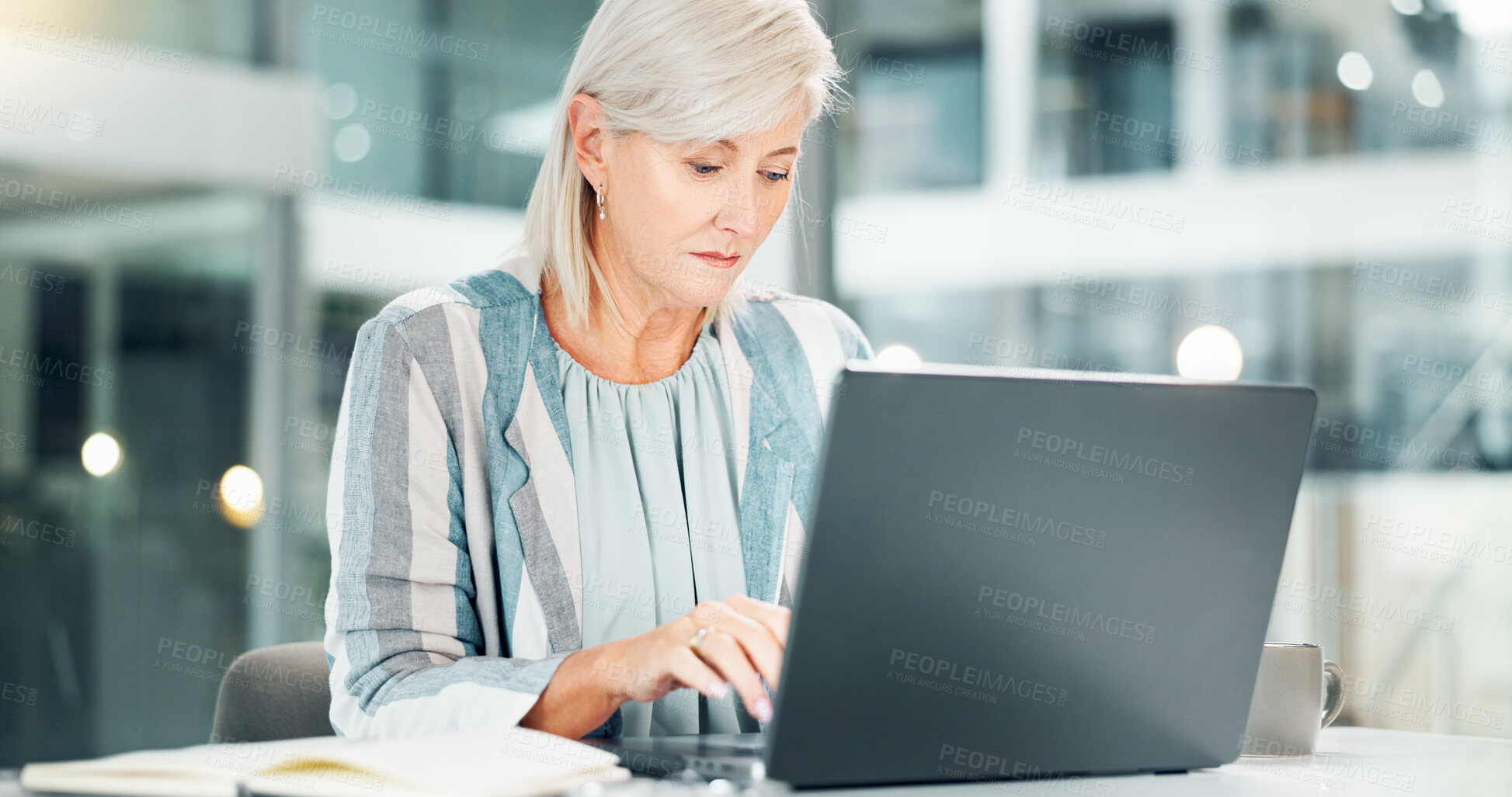 Buy stock photo Business, typing and mature woman with laptop, entrepreneur and planning for company growth and bokeh. Corporate, research and person with tech, information and online for investment in office