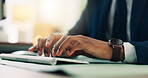 Laptop, hands and businessman in office typing for research with finance report for planning budget. Keyboard, tech and closeup of financial manager with online investment for company in workplace.