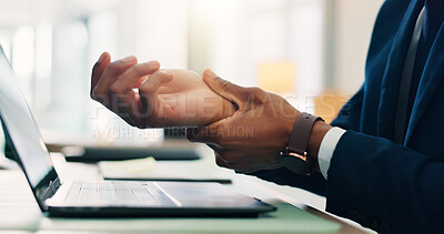 Buy stock photo Business person, hands and laptop with wrist injury for carpel tunnel, bruise or overworked at office desk. Closeup, employee or muscle tension with fibromyalgia for joint inflammation, strain or ache