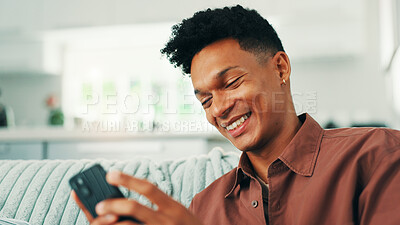 Buy stock photo Online dating, funny and man with phone in home for social media application, subscription or search. Sign up, meme or happy person laughing with mobile message on sofa for post, chat or news website