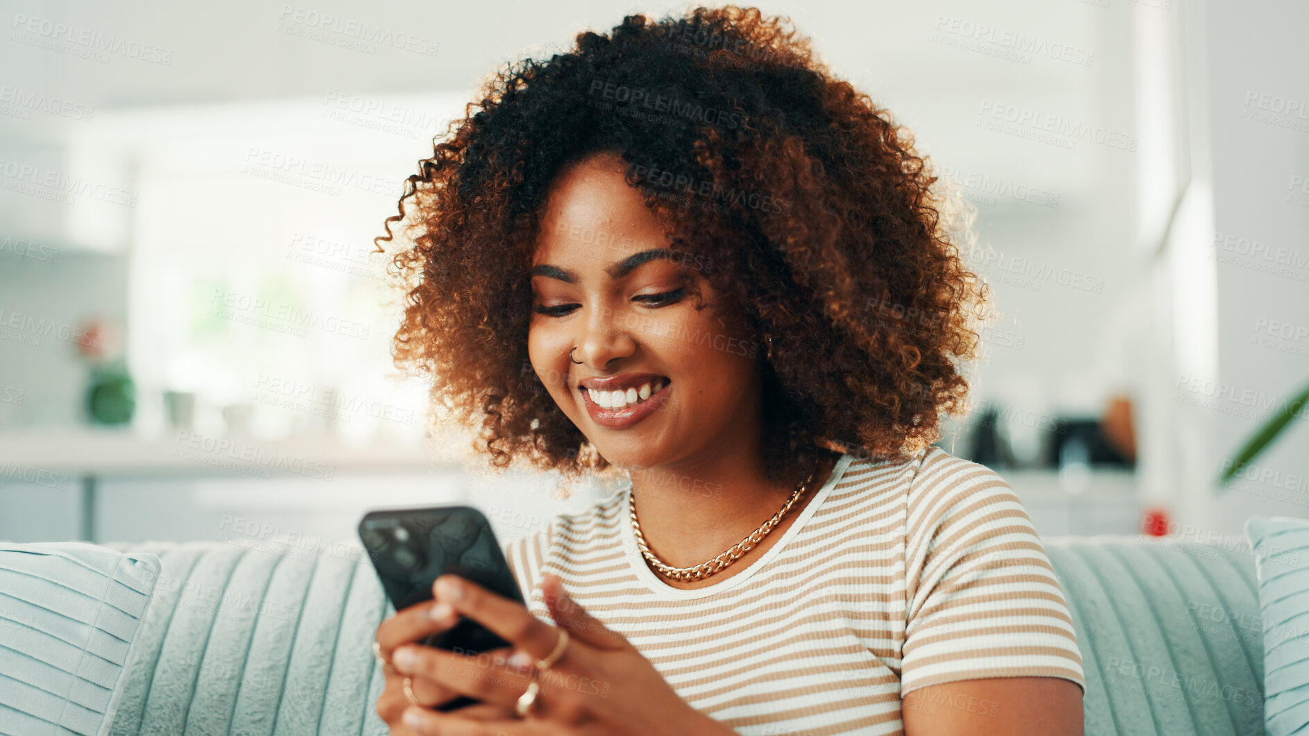 Buy stock photo Dating app, phone or happy woman texting in home on social media application and subscription on weekend. Reading, smile or female person with mobile message on sofa for post, chat and online website